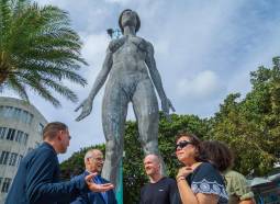 “R-Evolution,” a kinetic sculpture depicting a nude standing woman known for appearing at the Burning Man festival, was unveiled on Tuesday morning ahead of Miami Art Week next month. She’s 45-feet tall, 32,000 pounds and made out of steel.