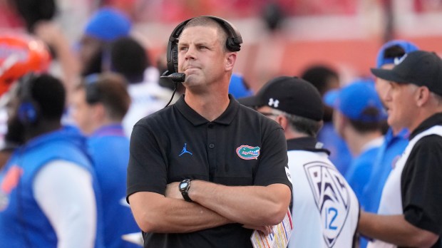 Florida coach Billy Napier is 11-12 with the Gators, but his recruiting prowess is expected to help the program weather the storm. (AP Photo/Rick Bowmer)