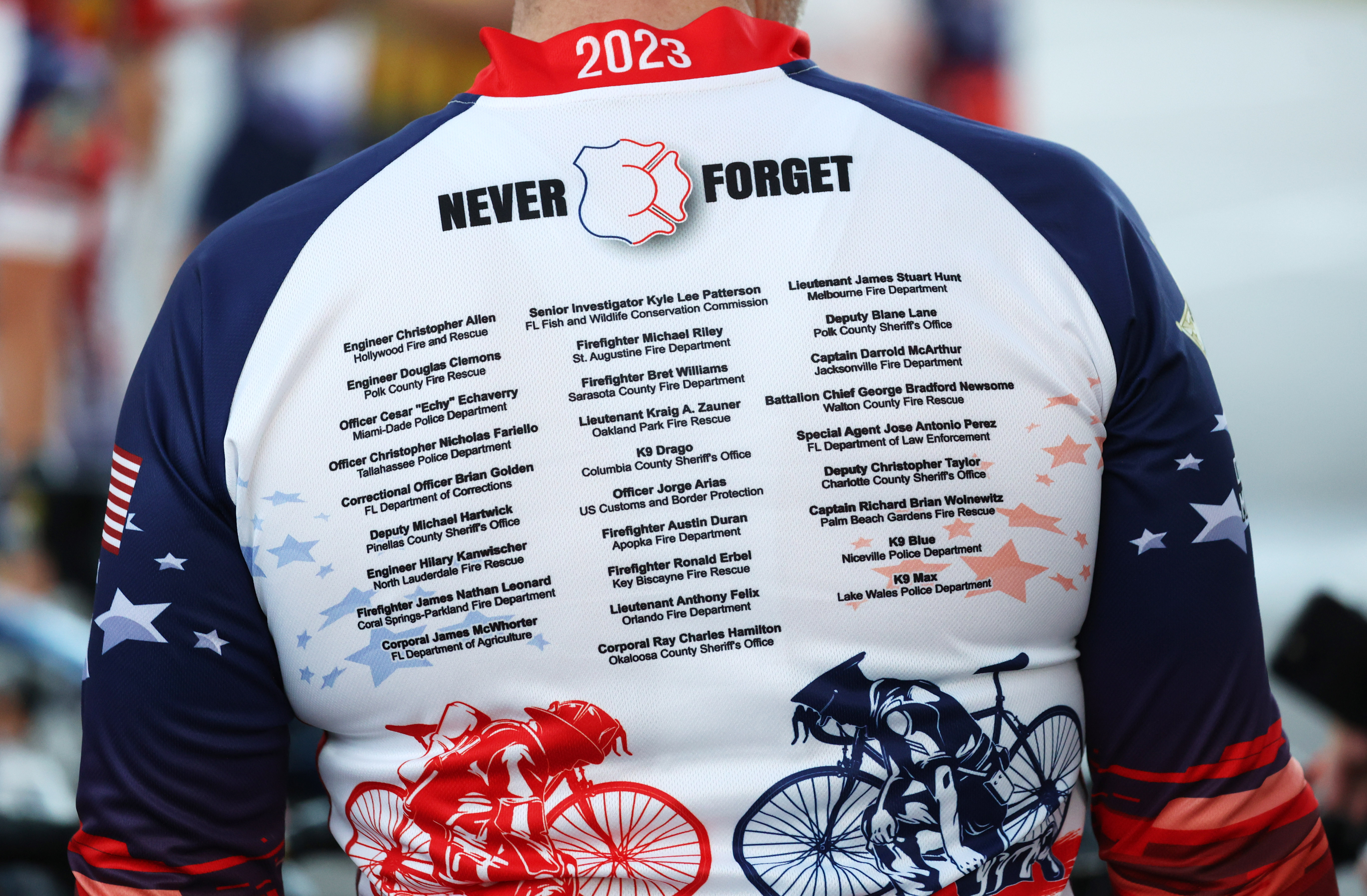 Detail of the Brotherhood Ride jerseys, with the names of the Florida Fallen First Responders who died in the line of duty in 2022 while protecting their communities, before they depart Elks Lodge 1079, on their way to Cocoa Beach, on Tuesday, October 31, 2023. They started in Naples and will end their 9-day ride through Florida in Miami.(Ricardo Ramirez Buxeda/ Orlando Sentinel)