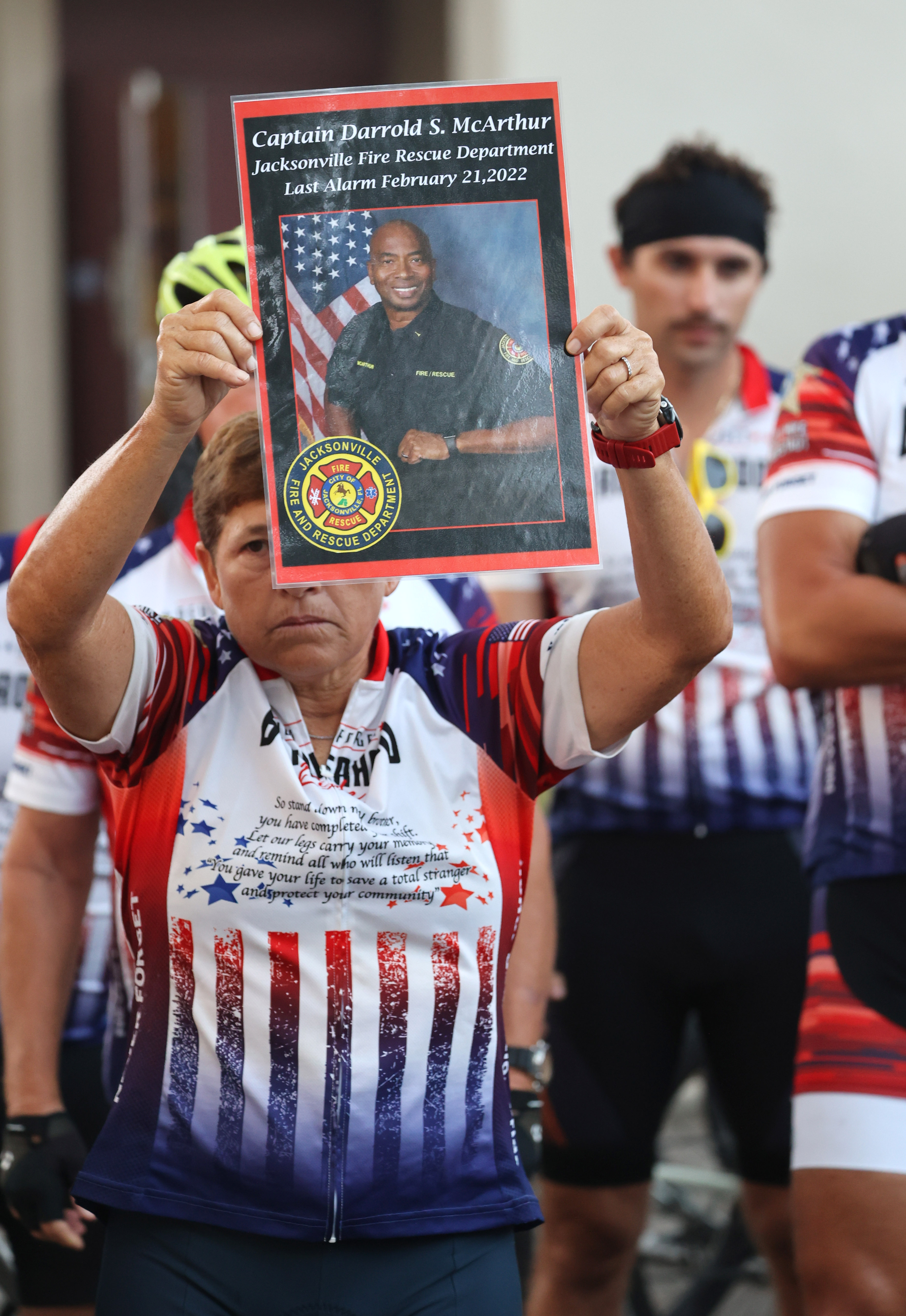 Remembrance poster for Jacksonville Fire Department Captain Darrold McArthur, before the Brotherhood Ride departs the Elks Lodge 1079, on their way to Cocoa Beach, on Tuesday, October 31, 2023. The ride is dedicated to the 28 Florida Fallen First Responders who died in the line of duty in 2022 while protecting their communities. They started in Naples and will end their 9-day ride through Florida in Miami.(Ricardo Ramirez Buxeda/ Orlando Sentinel)