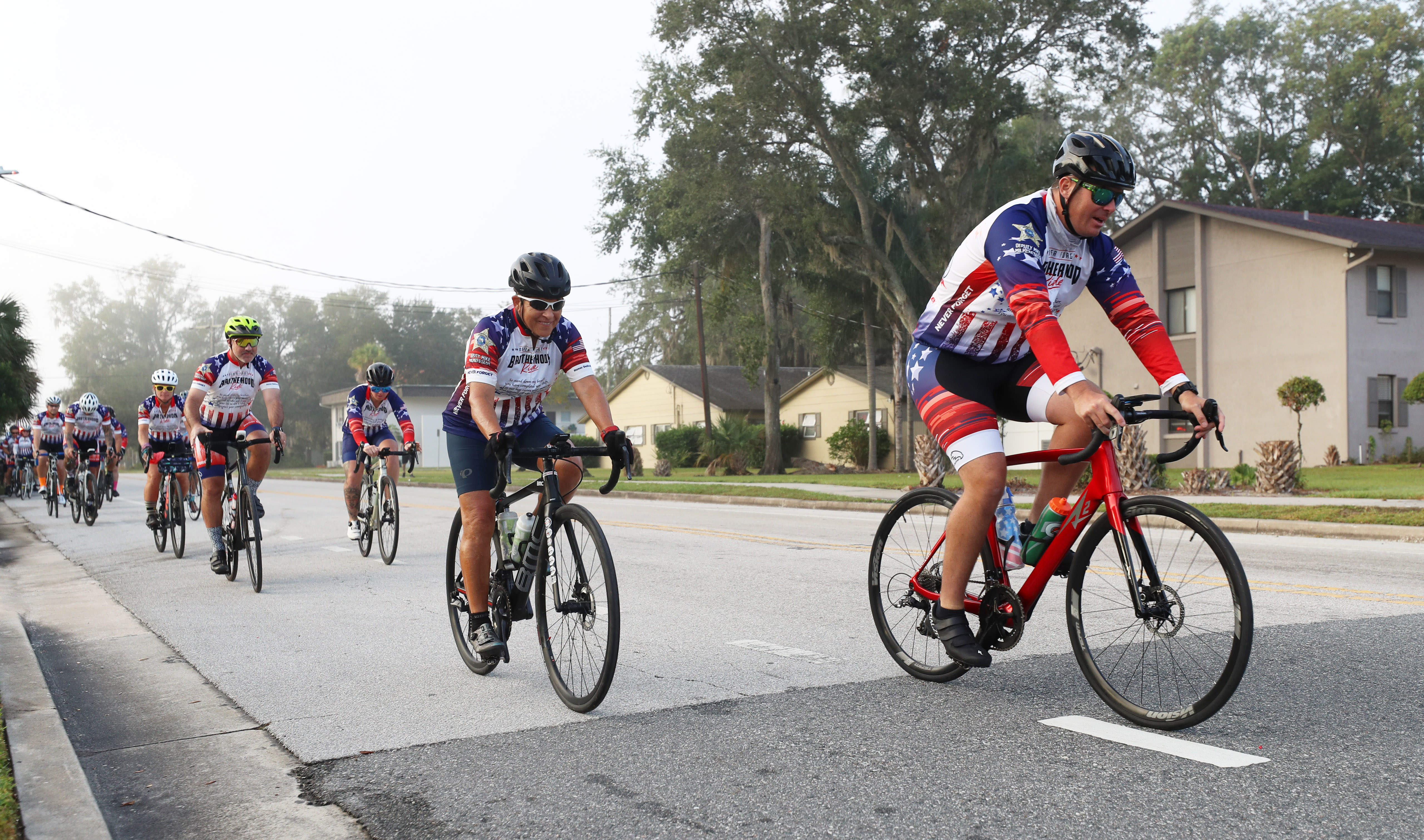 Cyclist participating in the Brotherhood Ride depart Elks Lodge 1079, on their way to Cocoa Beach, on Tuesday, October 31, 2023. The ride is dedicated to the 28 Florida Fallen First Responders who died in the line of duty in 2022 while protecting their communities. They started in Naples and will end their 9-day ride through Florida in Miami.(Ricardo Ramirez Buxeda/ Orlando Sentinel)