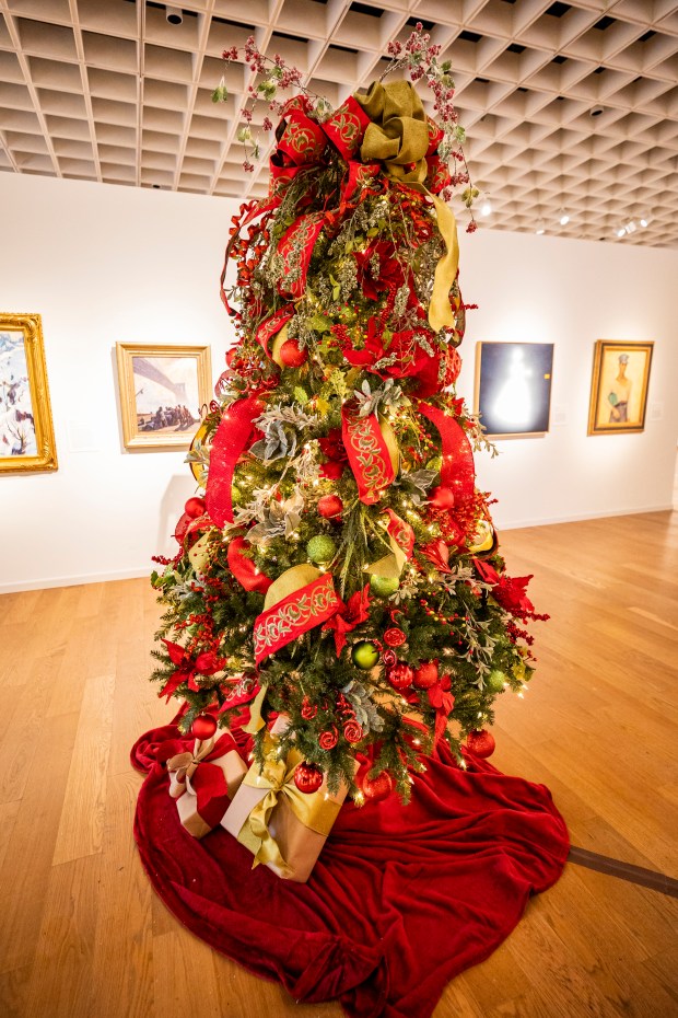 An elegant tree sponsored by Orlando Health is one highlight of the Festival of Trees, which returns to Orlando Museum of Art for its 37th year with 50 designer trees on Nov. 9, 2023. The event, a fundraiser for the museum, goes on Nov. 11-19. (Patrick Connolly/Orlando Sentinel)