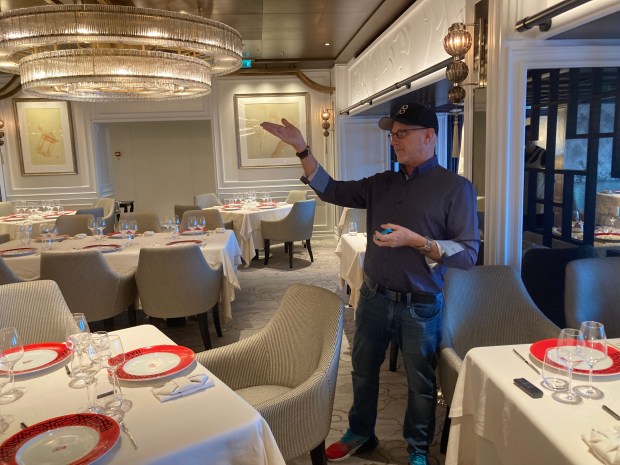 Studio Dado founding partner Greg Walton describes design work put into Red Ginger, a Pan-Asian dining venue on board Oceania Vista, the first new ship from Oceania Cruises in a decade, which arrived to PortMiami on Oct. 14, 2023. (Richard Tribou/Orlando Sentinel)