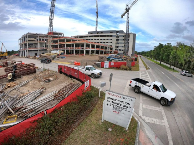 Located on the southeast corner of the site of the former Siemens-Stromberg telecommunications plant, construction continues at the new Orlando Health Lake Mary Hospital, photographed Tuesday, April 11, 2023. The adjacent Siemens-Stromberg complex was designated a hazardous waste site after groundwater contamination from solvent use was discovered in numerous onsite environmental tests over the last 20 years. (Joe Burbank/Orlando Sentinel)